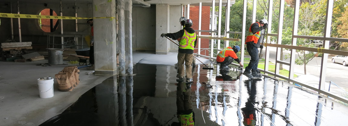 City Group Ltd. adding sealers to concrete floor.